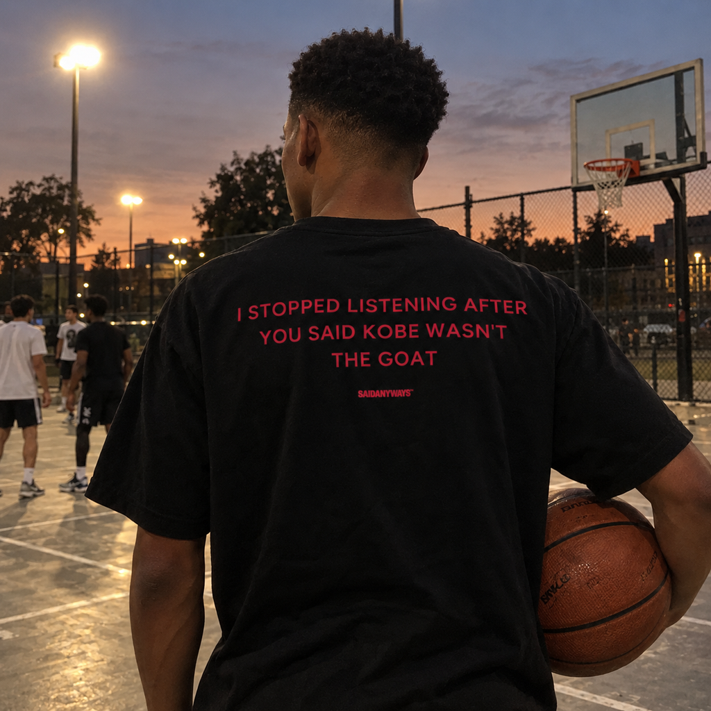 I Stopped Listening After You Said Kobe Wasn't The GOAT black tee, worn on a basketball court