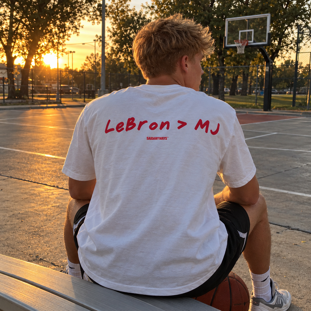 LeBron > MJ Basketball Debate white tee, worn on a basketball court