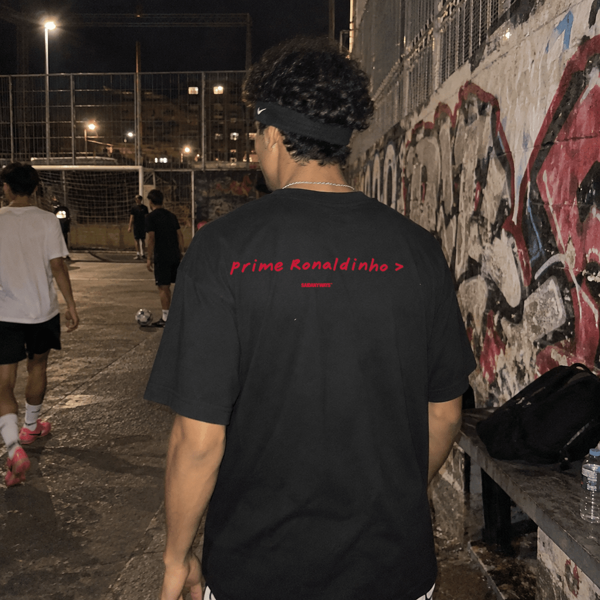 Prime Ronaldinho > Football Debate — Black Tee - SAIDANYWAYSPrime Ronaldinho > Football Debate — Black TeeT-ShirtSAIDANYWAYS